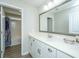 Clean bathroom with white cabinets, quartz countertop, and a large mirror at 394 Sanctuary Park Dr, Summerville, SC 29486