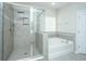 Spa-like bathroom with walk-in shower and garden tub at 394 Sanctuary Park Dr, Summerville, SC 29486
