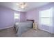 Purple bedroom with a full-size bed and ceiling fan at 394 Sanctuary Park Dr, Summerville, SC 29486