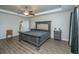 Main bedroom with king-size bed and access to the bathroom at 394 Sanctuary Park Dr, Summerville, SC 29486