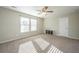 Bright bedroom with ceiling fan, neutral walls, carpet, and ample natural light at 394 Sanctuary Park Dr, Summerville, SC 29486