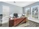 Home office with a large desk, comfortable chair, and plenty of natural light at 394 Sanctuary Park Dr, Summerville, SC 29486