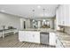 Open concept kitchen with island, granite countertops, and stainless steel appliances at 394 Sanctuary Park Dr, Summerville, SC 29486