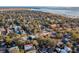 Wide aerial view of waterfront neighborhood with houses and church at 416 Bank St, Mount Pleasant, SC 29464