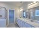 Double vanity bathroom with a large mirror and shower at 470 White Magnolia St, Moncks Corner, SC 29461