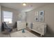 Charming Bedroom with a crib, changing table, and rocking chair at 470 White Magnolia St, Moncks Corner, SC 29461