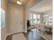 Elegant dining room with hardwood floors, chandelier, and a view to the backyard at 470 White Magnolia St, Moncks Corner, SC 29461