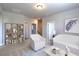 Bright loft area with a comfortable sitting area and built-in shelving at 470 White Magnolia St, Moncks Corner, SC 29461