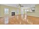 Hardwood floor living room with fireplace and access to kitchen at 5004 W Liberty Meadows Dr, Summerville, SC 29485