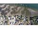 Aerial view of waterfront homes and private boat docks at 5655 Captain Kidd Rd, Hollywood, SC 29449