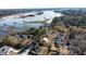 Aerial view of waterfront property with houses and expansive marsh views at 5655 Captain Kidd Rd, Hollywood, SC 29449