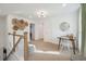 Bright loft hallway with a built-in desk and seating at 765 Opal Wing St, Moncks Corner, SC 29461