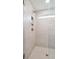 Clean shower with glass enclosure and herringbone tile floor at 765 Opal Wing St, Moncks Corner, SC 29461