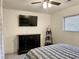 Bedroom with large TV, dresser, and plant stand at 812 Andrea Ln, Hanahan, SC 29410