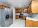 Kitchen with stainless steel appliances and wood cabinets at 8505 Mayfield Ct, North Charleston, SC 29406