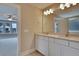 Double vanity bathroom with modern light fixtures and a spacious layout at 8623 Connor Ct, North Charleston, SC 29406