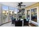 Relaxing screened porch with outdoor seating at 9000 Palmetto Dr # 103C, Isle of Palms, SC 29451