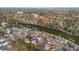 Aerial view showcasing a neighborhood's layout near a tranquil lake at 1014 Ariel Ct, Summerville, SC 29485