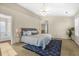 Main bedroom with ensuite bathroom and carpet at 1014 Ariel Ct, Summerville, SC 29485