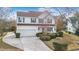 Two-story house with white siding, green shutters, and a red front door at 1014 Ariel Ct, Summerville, SC 29485