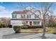 Two-story house with white siding, green shutters, and a red front door at 1014 Ariel Ct, Summerville, SC 29485