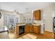 Eat-in kitchen with wood cabinets, breakfast nook, and a view to the Gathering room at 1014 Ariel Ct, Summerville, SC 29485