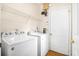 Convenient laundry room with washer, dryer, and shelving at 1014 Ariel Ct, Summerville, SC 29485