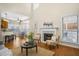 Bright living room with hardwood floors, fireplace, and access to the kitchen at 1014 Ariel Ct, Summerville, SC 29485