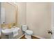 Small powder room with pedestal sink and toilet at 1014 Ariel Ct, Summerville, SC 29485