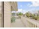 Relaxing balcony with two green adirondack chairs at 109 Carolina Blvd, Isle of Palms, SC 29451