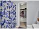 Bathroom with shower, floral shower curtain, and walk-in closet at 112 Avonshire Dr, Summerville, SC 29483