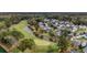 Community overview with houses, golf course, and pond at 113 History Ln, Summerville, SC 29485