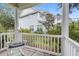 Relaxing back porch with rocking chair and view of yard at 113 History Ln, Summerville, SC 29485