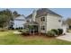 Spacious backyard with screened porch and patio area at 113 History Ln, Summerville, SC 29485
