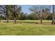 Serene backyard with pond and golf course views at 113 History Ln, Summerville, SC 29485