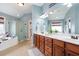 Spa-like bathroom with double vanity and soaking tub at 113 History Ln, Summerville, SC 29485