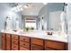 Double vanity bathroom with a large mirror at 113 History Ln, Summerville, SC 29485