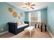 Upstairs bedroom with a daybed, foosball table, and window at 113 History Ln, Summerville, SC 29485