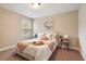 Bedroom with a queen bed and window at 113 History Ln, Summerville, SC 29485