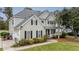 Two-story house with a three-car garage and neatly landscaped yard at 113 History Ln, Summerville, SC 29485