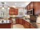 Modern kitchen with granite countertops and stainless steel appliances at 113 History Ln, Summerville, SC 29485