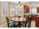 Kitchen breakfast nook with a round table and seating for four at 113 History Ln, Summerville, SC 29485