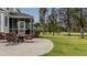 Relaxing patio with fire pit and golf course view at 113 History Ln, Summerville, SC 29485