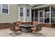 Patio furniture with fire pit for outdoor relaxation at 113 History Ln, Summerville, SC 29485