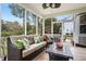 Spacious screened porch, perfect for relaxing and enjoying the outdoors at 113 History Ln, Summerville, SC 29485