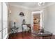 Bright sitting room with hardwood floors, large windows, and a workspace at 113 History Ln, Summerville, SC 29485