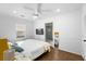 Bright bedroom with yellow headboard and en-suite bathroom at 1132 Carter Ave, Mount Pleasant, SC 29464