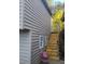 House side view with stairs and garage at 1150 King St, Charleston, SC 29403
