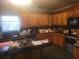 Spacious kitchen with wood cabinets and island at 1150 King St, Charleston, SC 29403