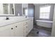 Bathroom boasts a soaking tub and double vanity at 120 Wilder Rd, Saint Stephen, SC 29479